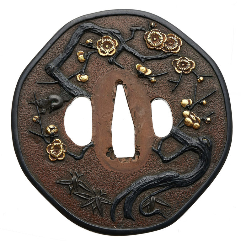 Large iron Japanese tsuba with daruma motif and lotus on the ura