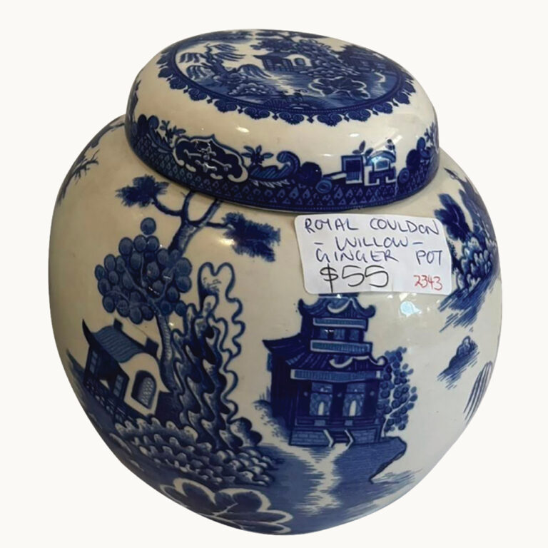 A ceramic ginger jar by Royal Cauldon and decorated with the blue and white Willow pattern