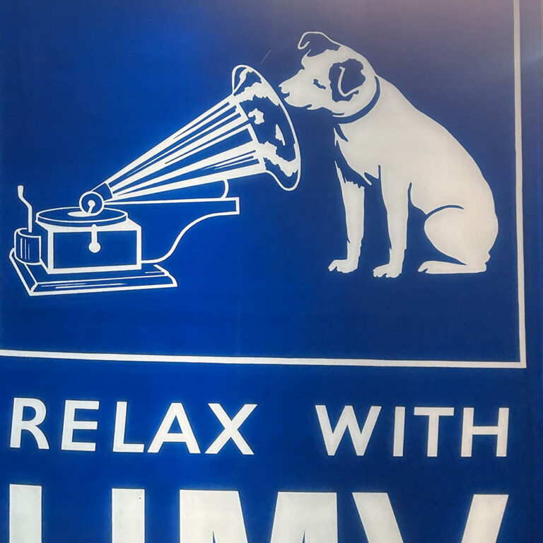 An oversized HMV double-sided vintage lightbox