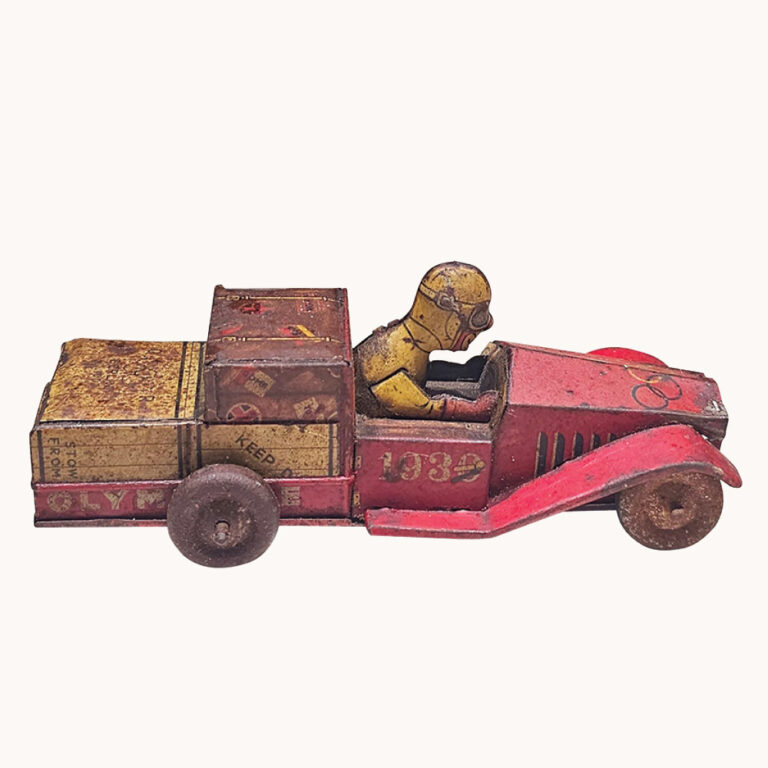 Vintage tin clockwork toy racing car
