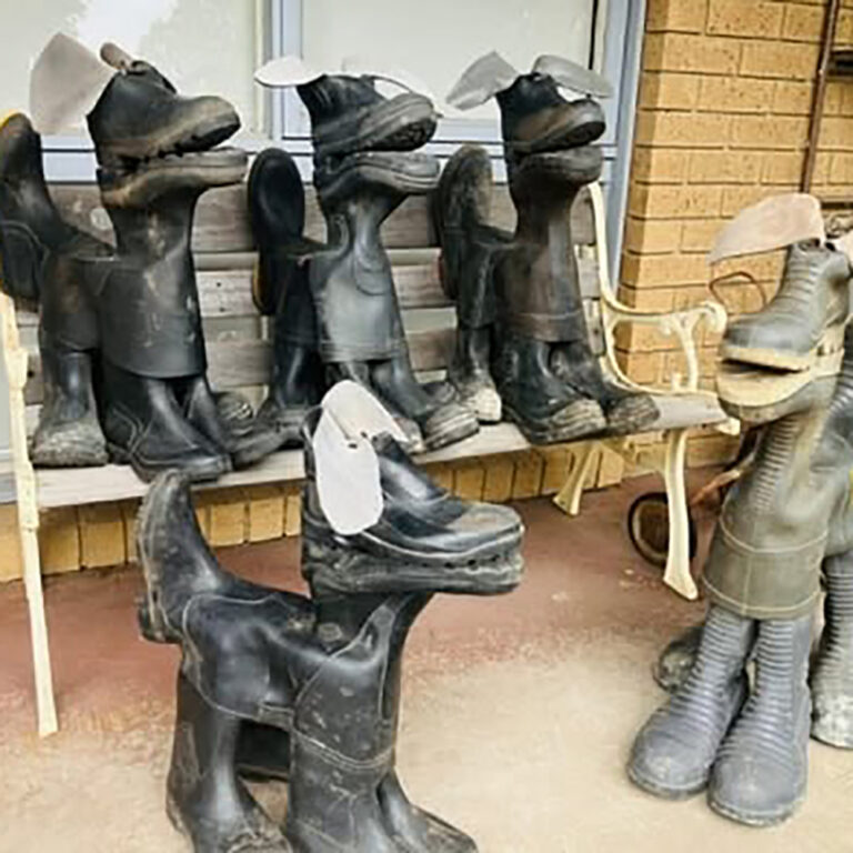 Gumboot dog sculpture hand made using reclaimed gumboots and recycled timber framework