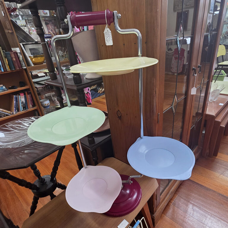 An Australian mid century cake stand in chrome and Bakelite c.1950