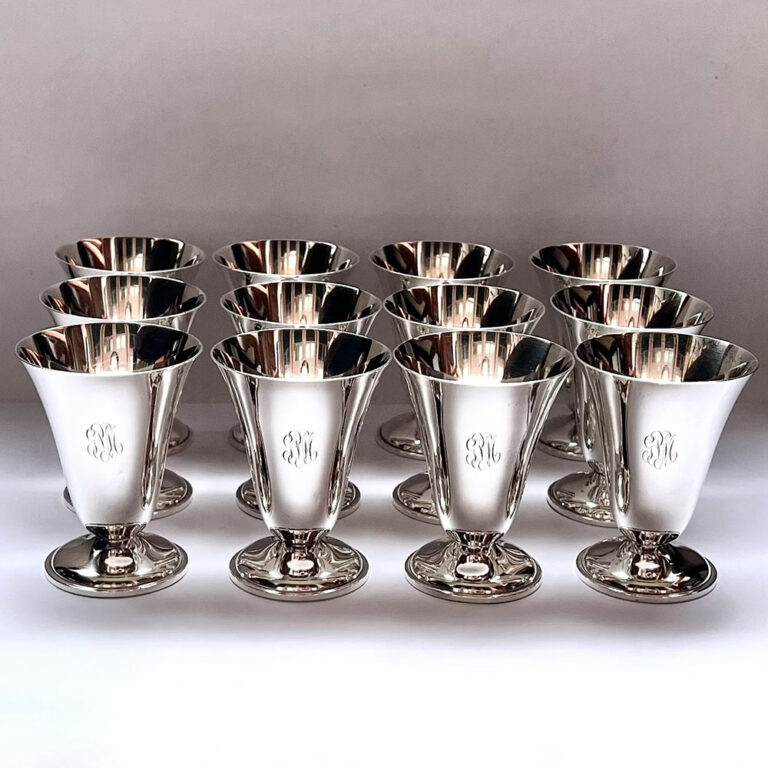 Set of 12 antique American sterling silver cups, with the early stylised hammer mark and initials of Julius Olaf Randahl