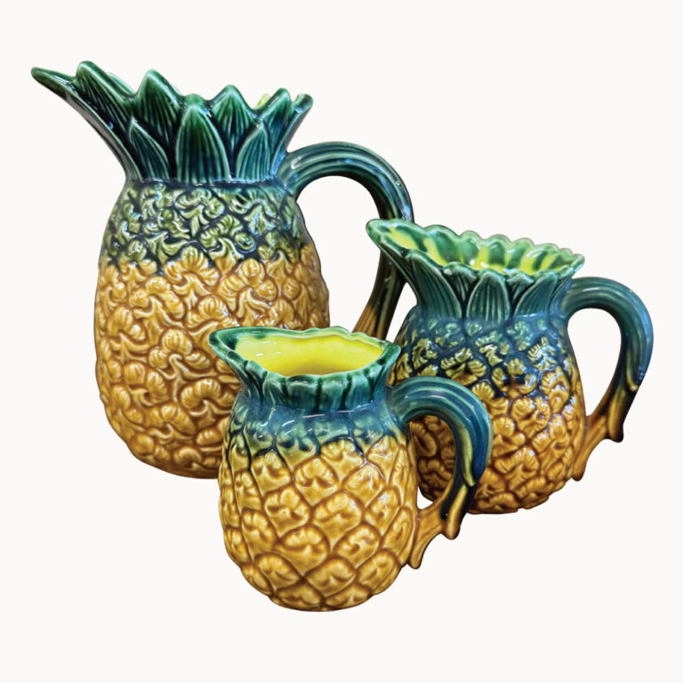 Set of three novelty jugs in the form of pineapples