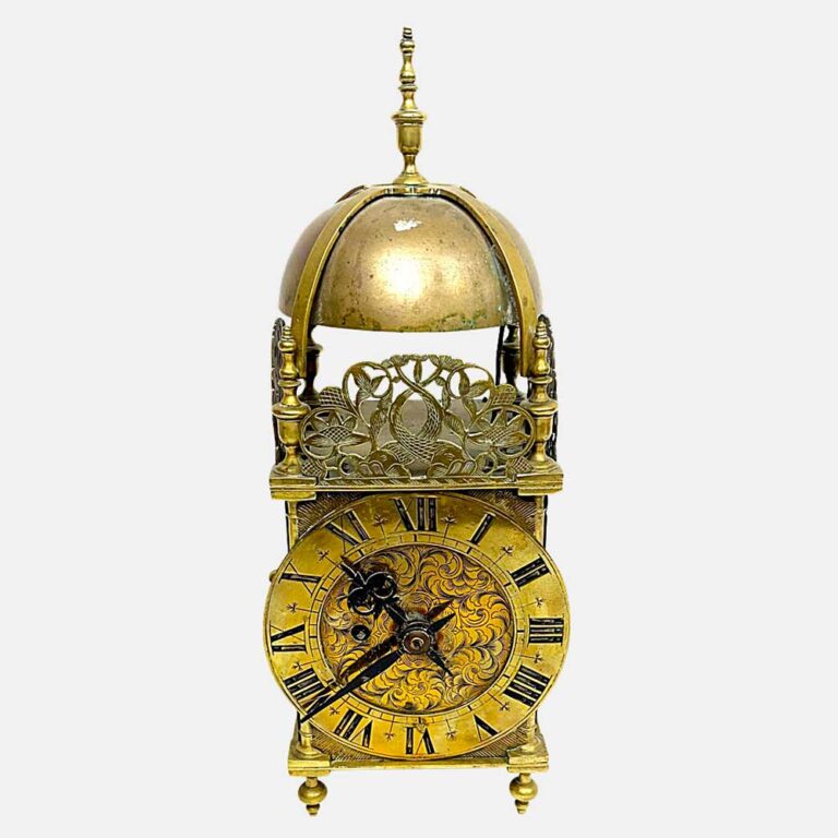 A Lantern Clock, Featuring a Brass Case, Strapped Bell on Top, and Decorative Pierced Frets, With Key and Pendulum