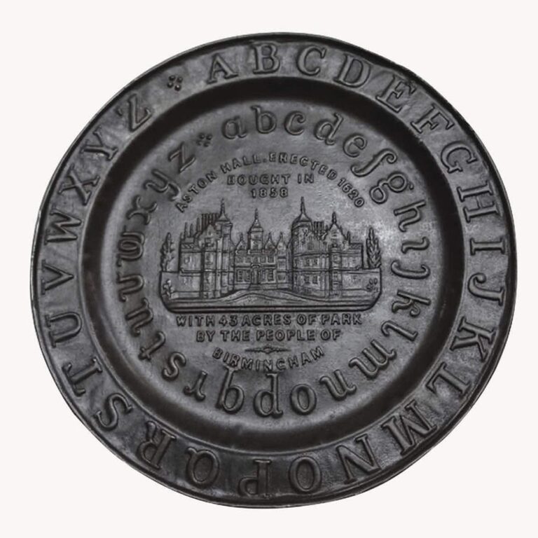 unusual tin double-alphabet plate depicting Aston Hall