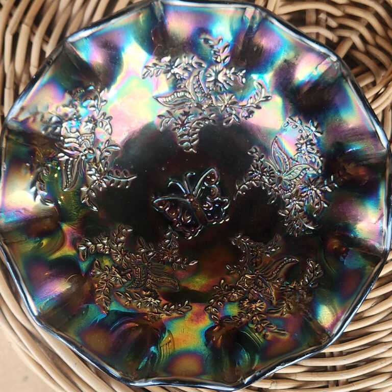 Beautiful amethyst carnival glass bowl on brass stand
