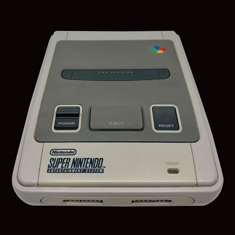 Vintage Super Nintendo game in good condition with two controllers and leads