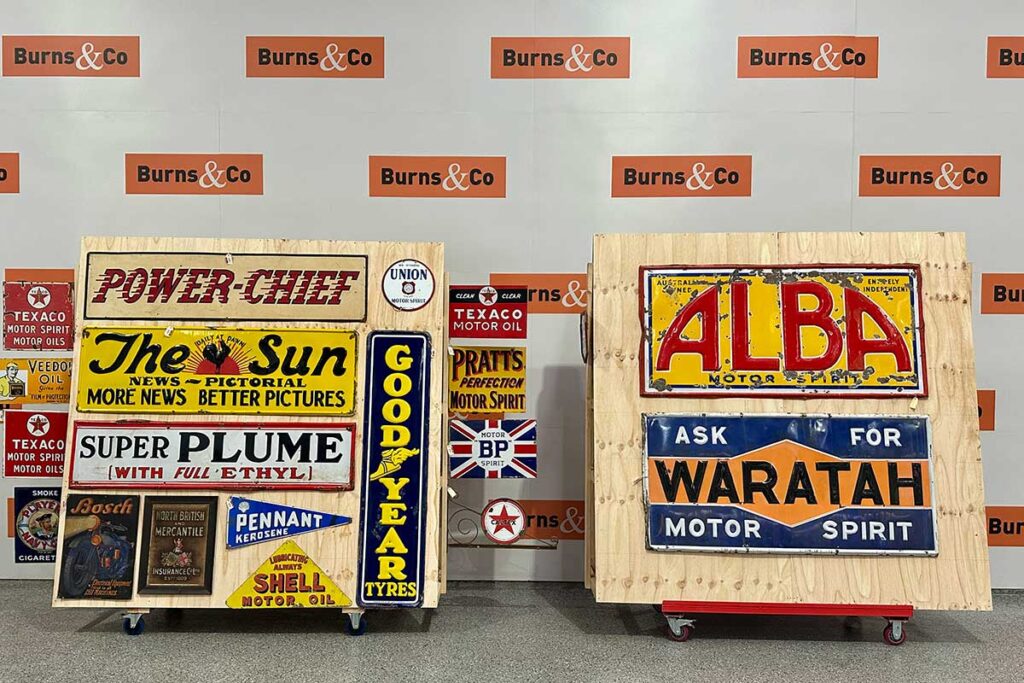 Signs display in the Burns Next Level Collectors Auction