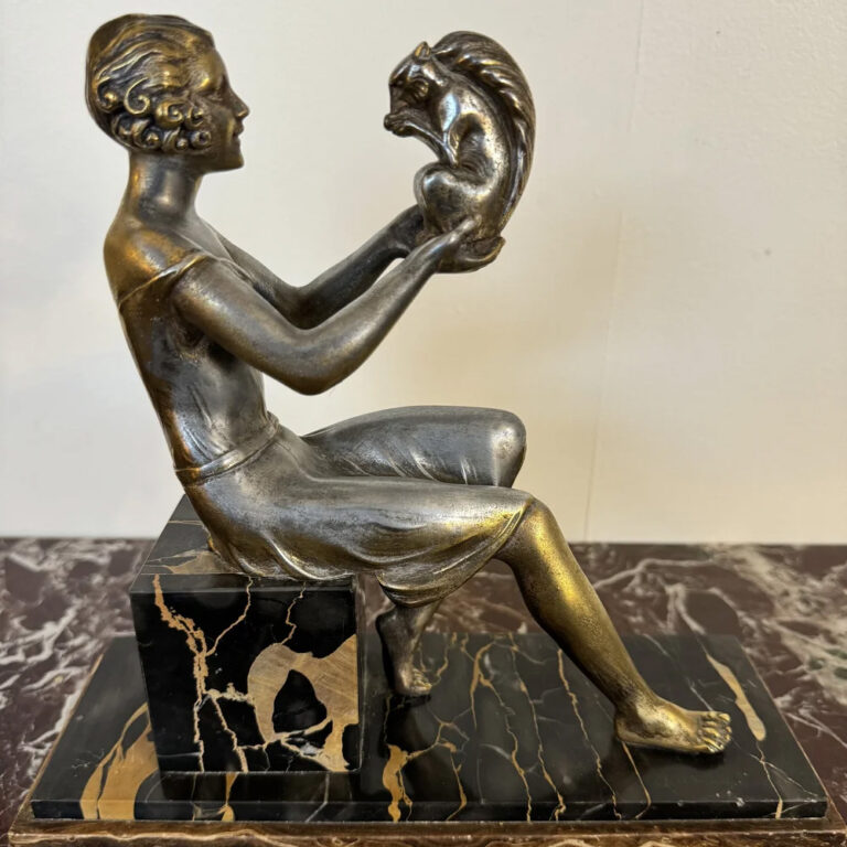 Stunning French Art Deco figure of a woman In silvered and gilt spelter c.1925