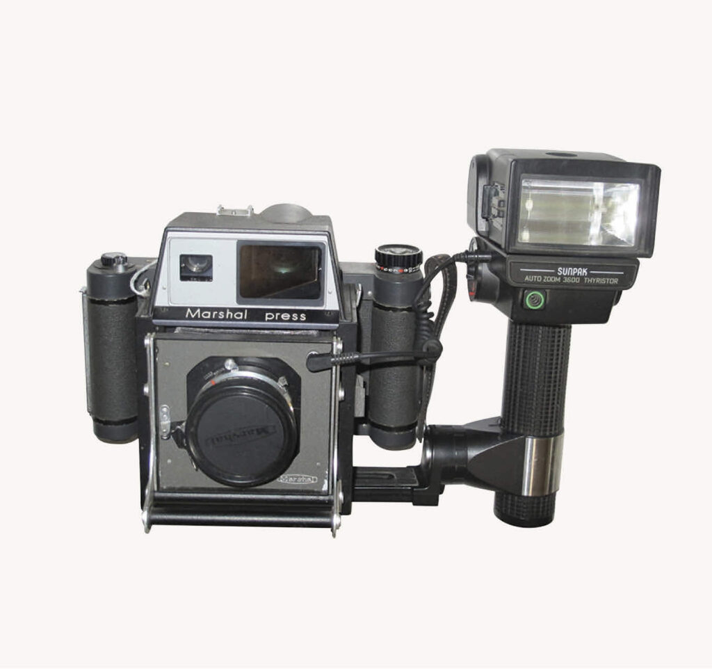 Marshall press camera with flash gun
