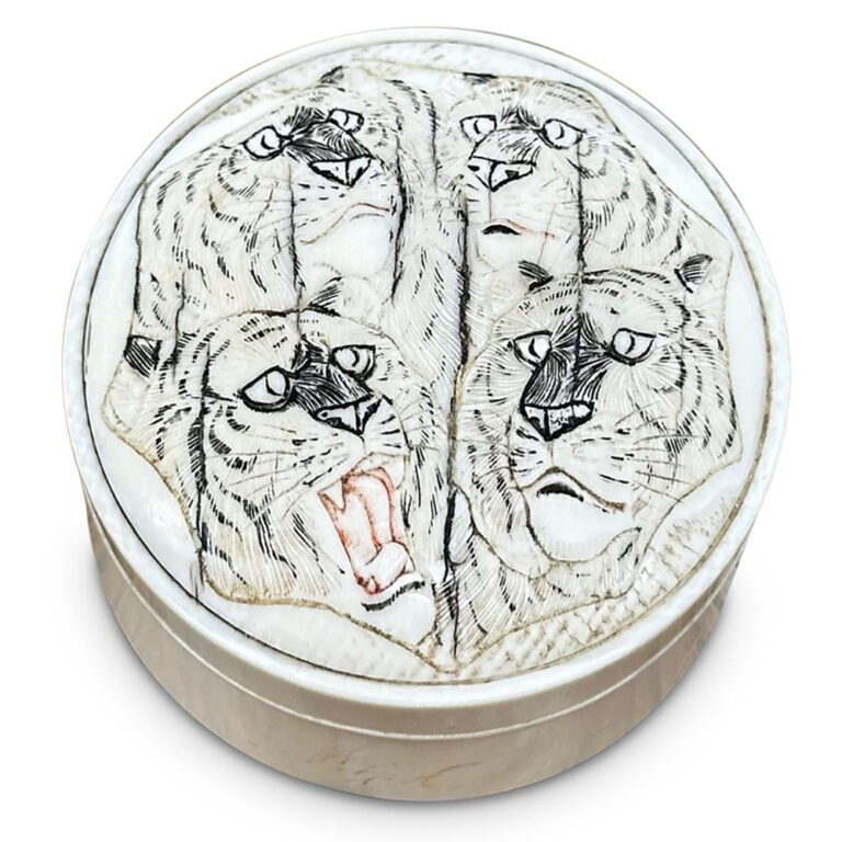 Early 20th century ivory lidded box Engraved with four tigers