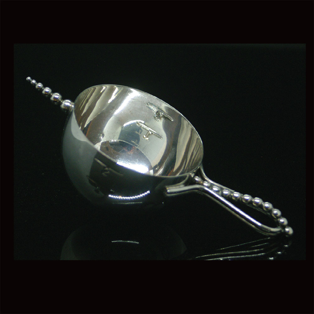 Vintage 1950s Napier ‘Bottoms Up’ silverplated jigger.