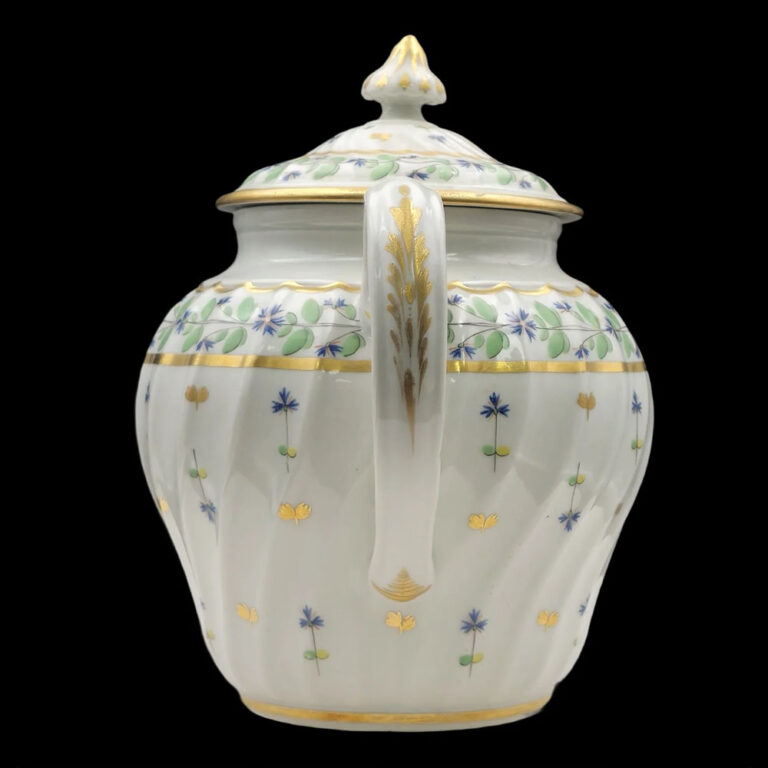 A Worcester Wrythen teapot c.1800, decorated with restrained flowers and leaves after a French model