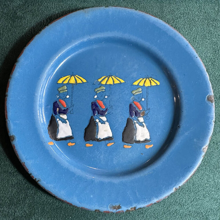 A charming 1930s European enamel plate.