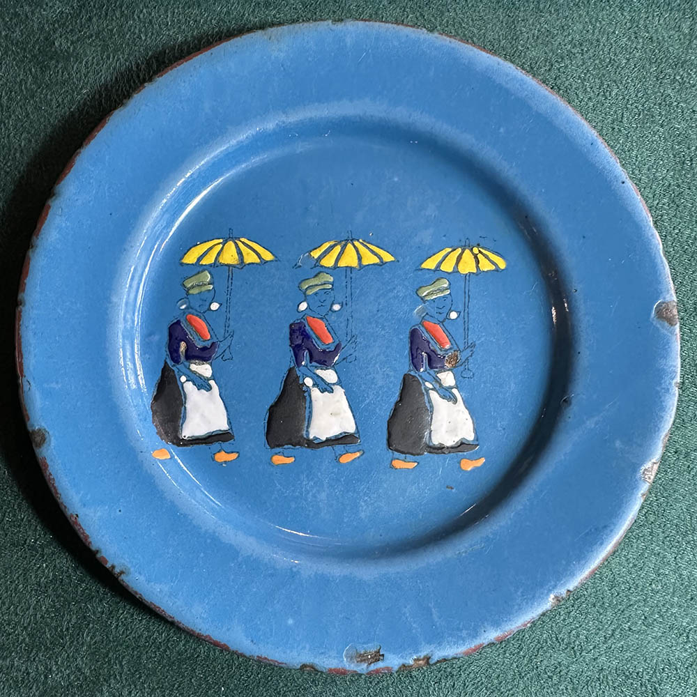 A charming 1930s European enamel plate.
