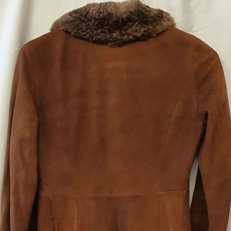 A stunning vintage 1970s Afghan suede coat with lambswool cuffs and collar. By Lisal of Melbourne
