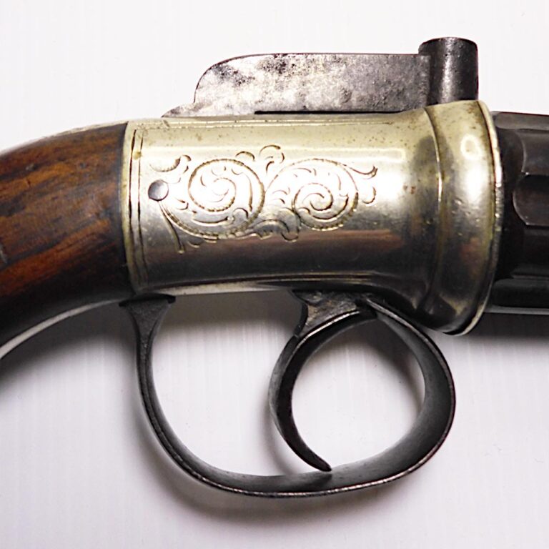 Antique English pepperbox pistol with German Silver engraved frame.