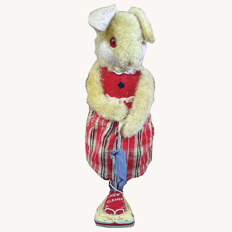 Novelty vintage toy rabbit with a vacuum cleaner, made in Japan.