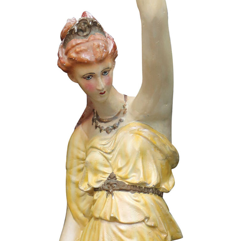 An Art Deco lady lamp with a flame shade