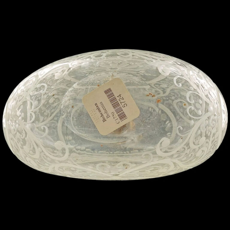 A moon-shaped blown glass decanter with elaborate wheel-cut engraving. Bohemia c.1750