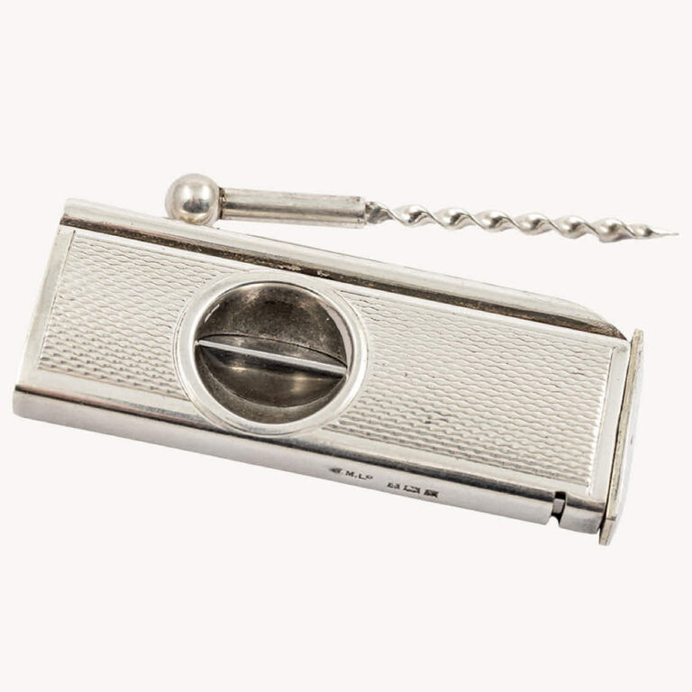 Late Art Deco sterling silver cigar cutter with original piercer, Birmingham 1956, William Manton Ltd.