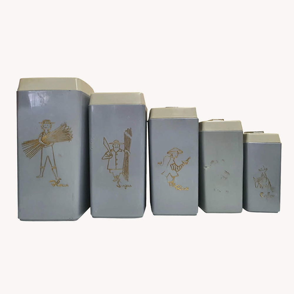 A retro set of five Nylex plastic kitchen canisters, stackable with lids