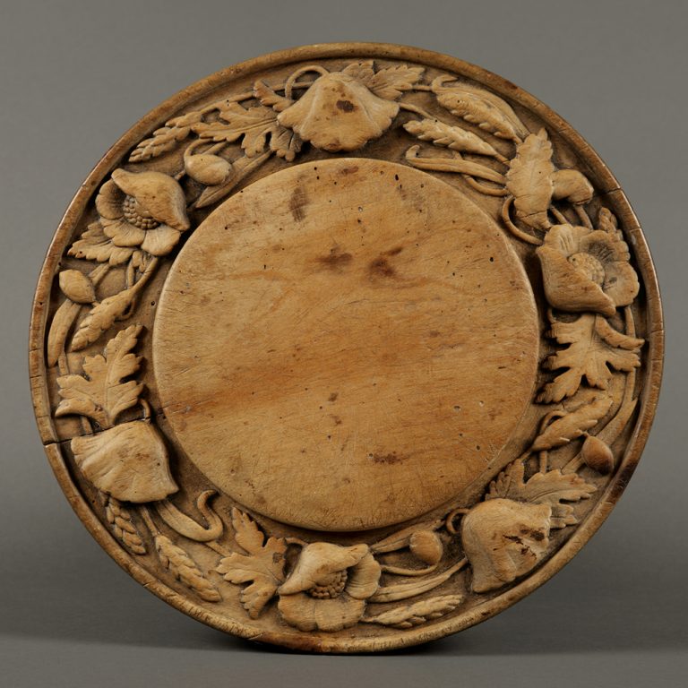 poppy and wheat carved sycamore breadboard
