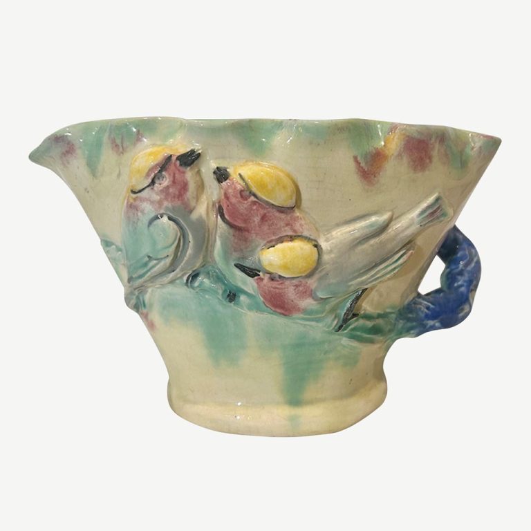 A gorgeous signed Castle Harris Australian pottery bird bowl with branch.