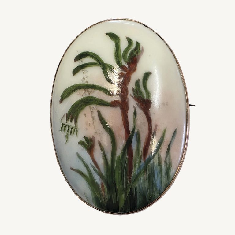 Australian hand painted porcelain brooch by may creeth