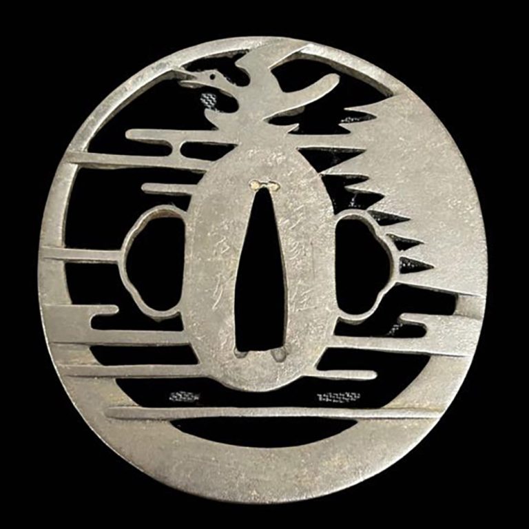 An antique samurai sword Japanese sukashi tsuba with a motif of a cuckoo and the moon.