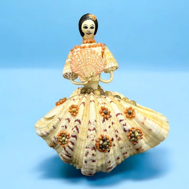retro kitsch 1960s seashell lady in a clamshell dress