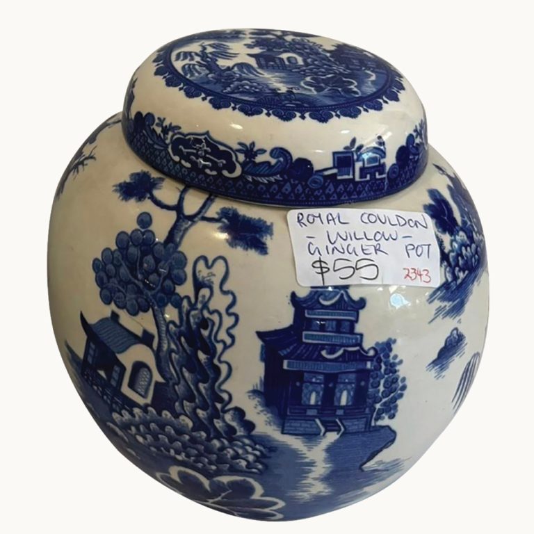 A ceramic ginger jar by Royal Cauldon and decorated with the blue and white Willow pattern