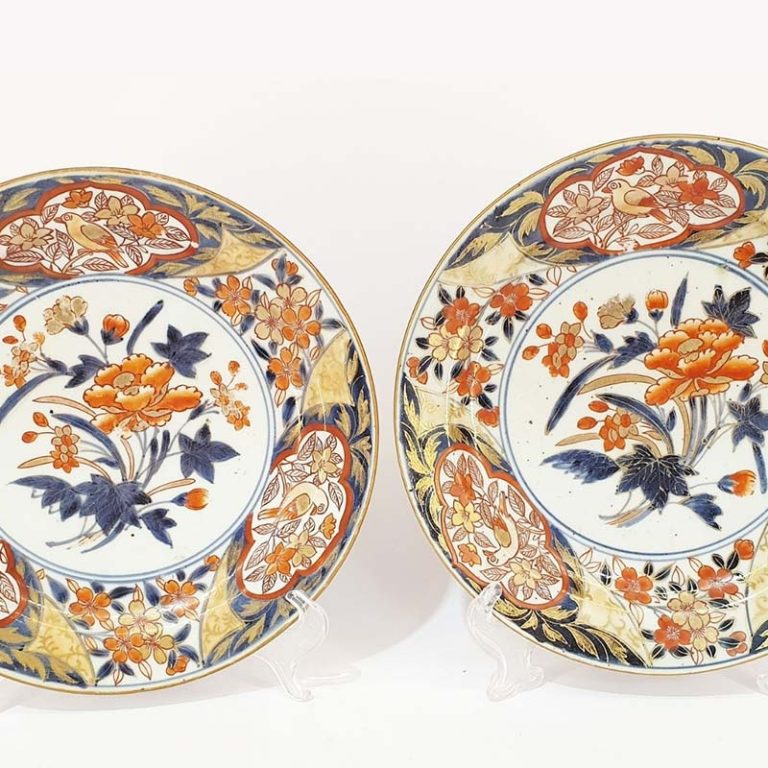 A pair of old Imari porcelain plates