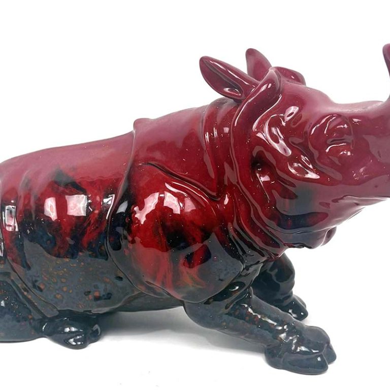 A Royal Doulton Ffambe porcelain rhinoceros at Theodore Bruce auction.