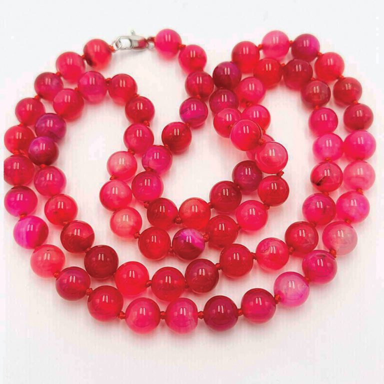 Vintage long necklace of pink chalcedony beads