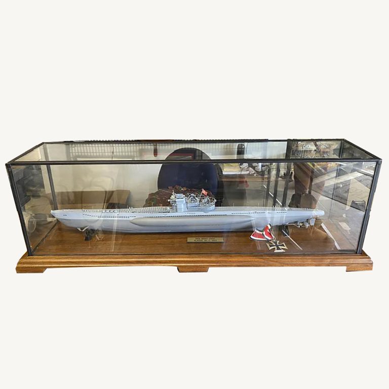 German U boat model in glass case with iron cross medal