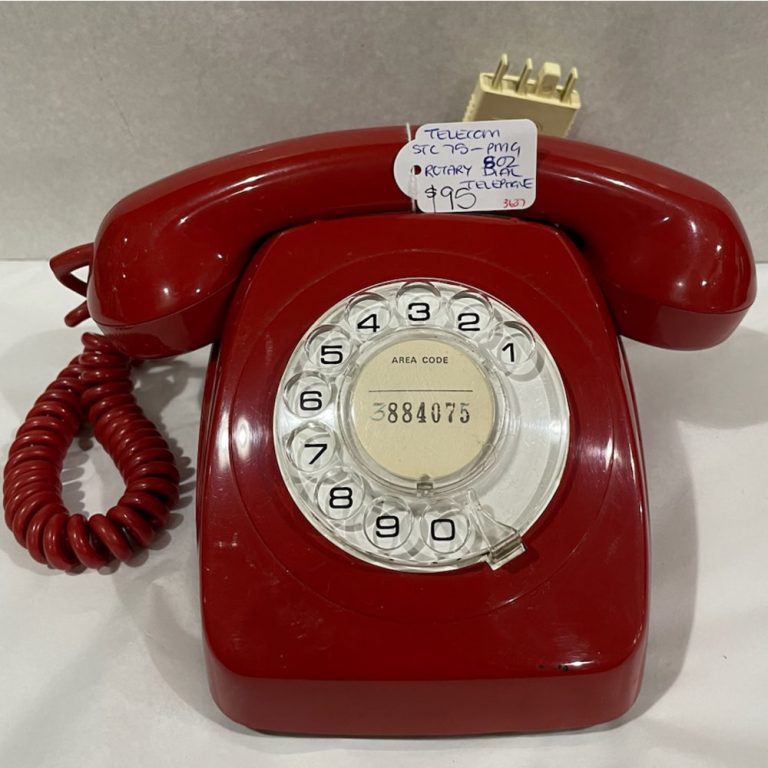 Red rotary dial telephone PMG-802