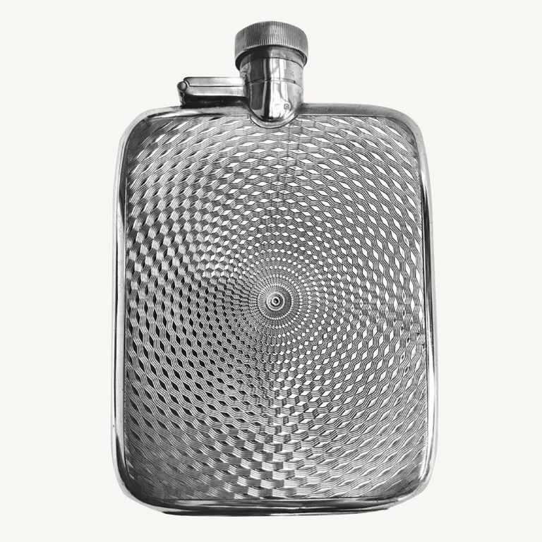 sterling silver hipflask with a finely engine-turned spiralling design